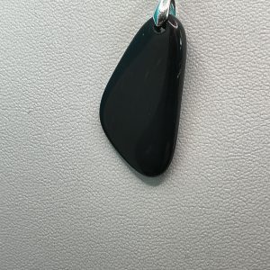 Black Obsidian necklace featuring a polished deep black volcanic stone pendant on a delicate chain, elegant natural gemstone jewelry for everyday wear.